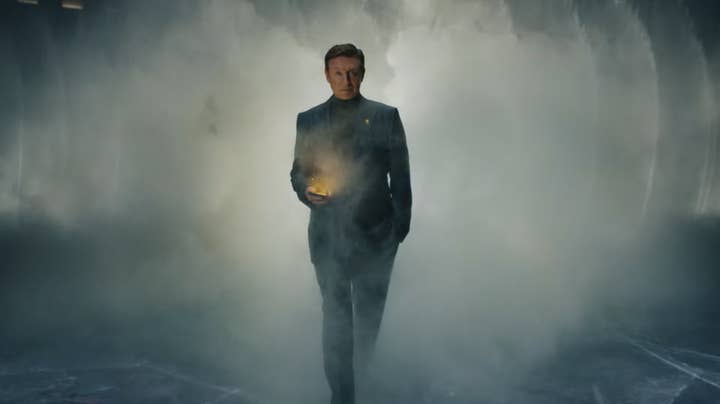 Wayne Gretzky emerging from a cloud of mist in a nice suit, a golden glowing cell phone in his hand