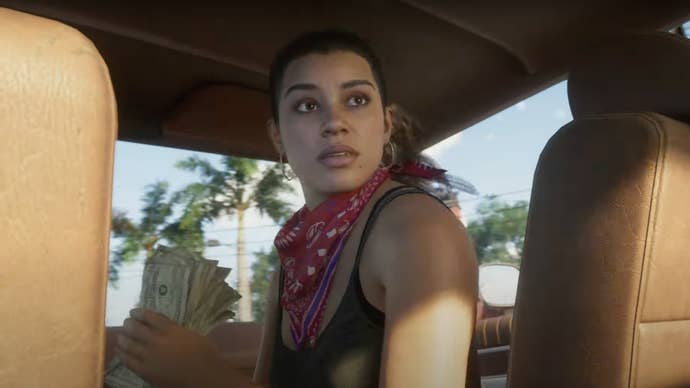 GTA 6 character Lucia sitting in a car during a police getaway.