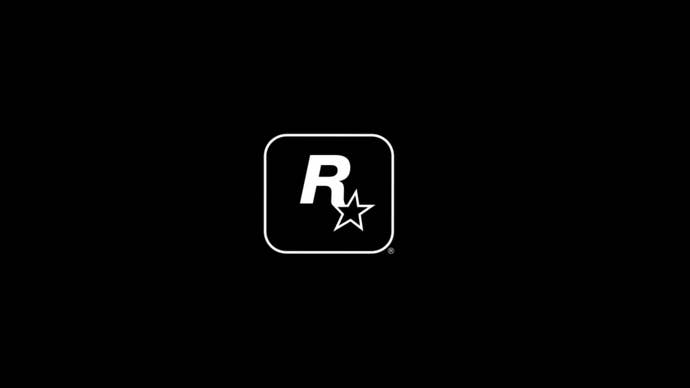 PS5のGTA 5トレーラーから撮影されたロックスターゲーム用の白いロゴを備えた黒い背景。
