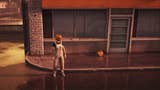 gta online character in pumpkin mask standing next to jack o lantern on floor by building door