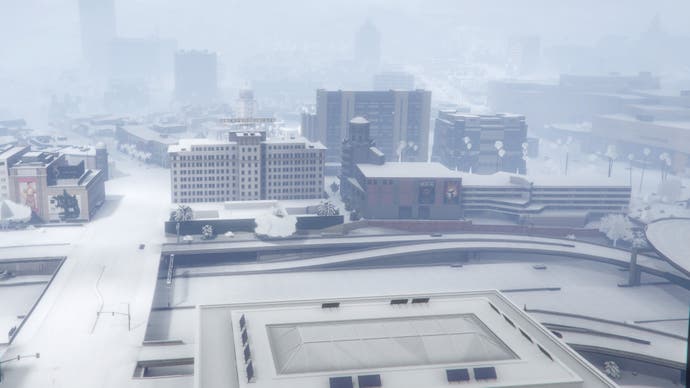 GTA Online, una vista de ático del centro y la autopista durante la nevada anual