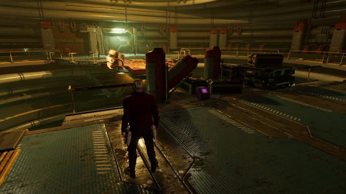 Star-Lord standing in circular room with outfit box nearby some crates. Rest of Guardians team are on the other side of room.