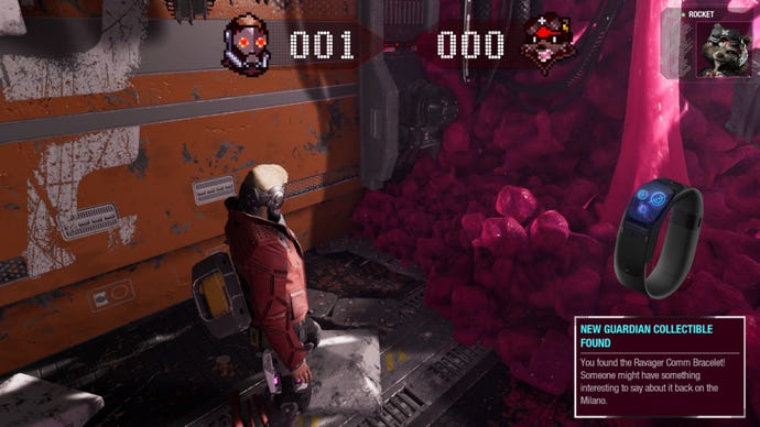 Star-Lord stood in the corner of a room, scoreboard against Rocket at the top of the screen and pink gunk is all over the wall