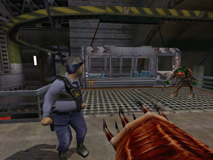 A security guard looks on as aliens attack in Half Life: Opposing Force