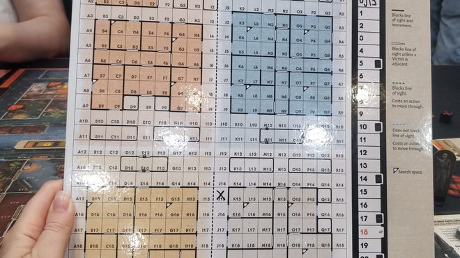 An image of the hidden player grid board for the Halloween board game.