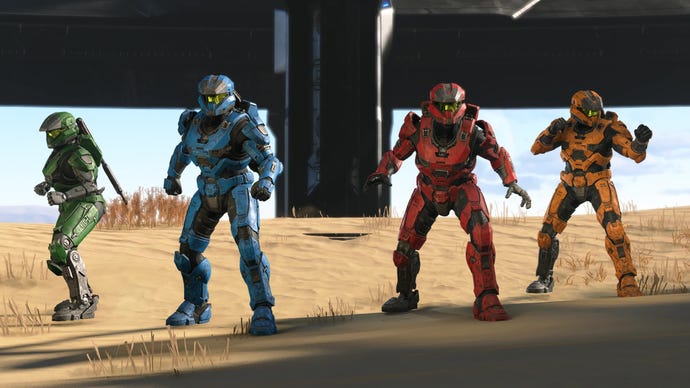 Four Spartans, all rocking primary colours, stand ready for battle in Halo Infinite.
