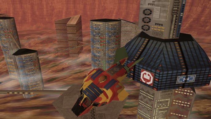 A red and yellow personal spaceship flies through the blocky low-res towers of a city in Hardwar