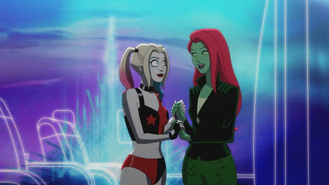 Harley Quinn holds hands with Poison Ivy