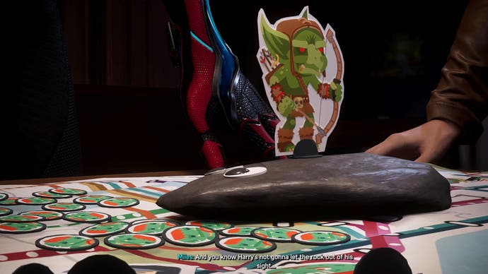 Peter, Miles and MJ used a green goblin token to represent Harry when they went over their plan get rid of Venom in Marvel's Spider-Man 2