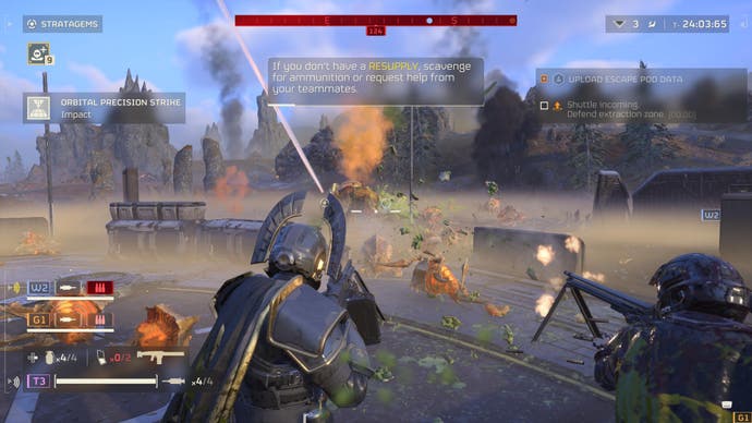 Capture d'écran de Helldivers 2 montrant le joueur et un allié tirant des mitrailleuses lourdes sur une vague d'ennemis robots venant en sens inverse.