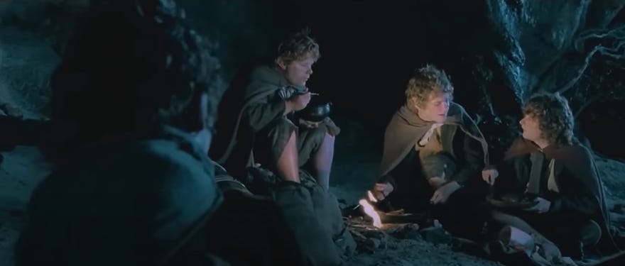 Still image from Lord of the Rings featuring four hobbits