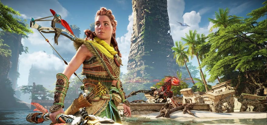 A screenshot of Horizon Forbidden West showing protagonist Aloy posing in front of a tropical water scene, with a robot dinosaur looking menacing on a nearby shore.
