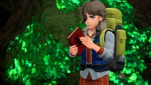 Pokemon Scarlet and Violet Hidden Abilities: An anime man with grey hair and a blue vest over a white shirt is standing in front of a glowing green moss formation. He holds a book in his hands and has a yellow pack on his back