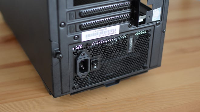 A PSU fully installed inside a gaming PC.