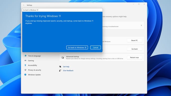 Windows 11 thanking the user before offering the button to roll back to Windows 10.