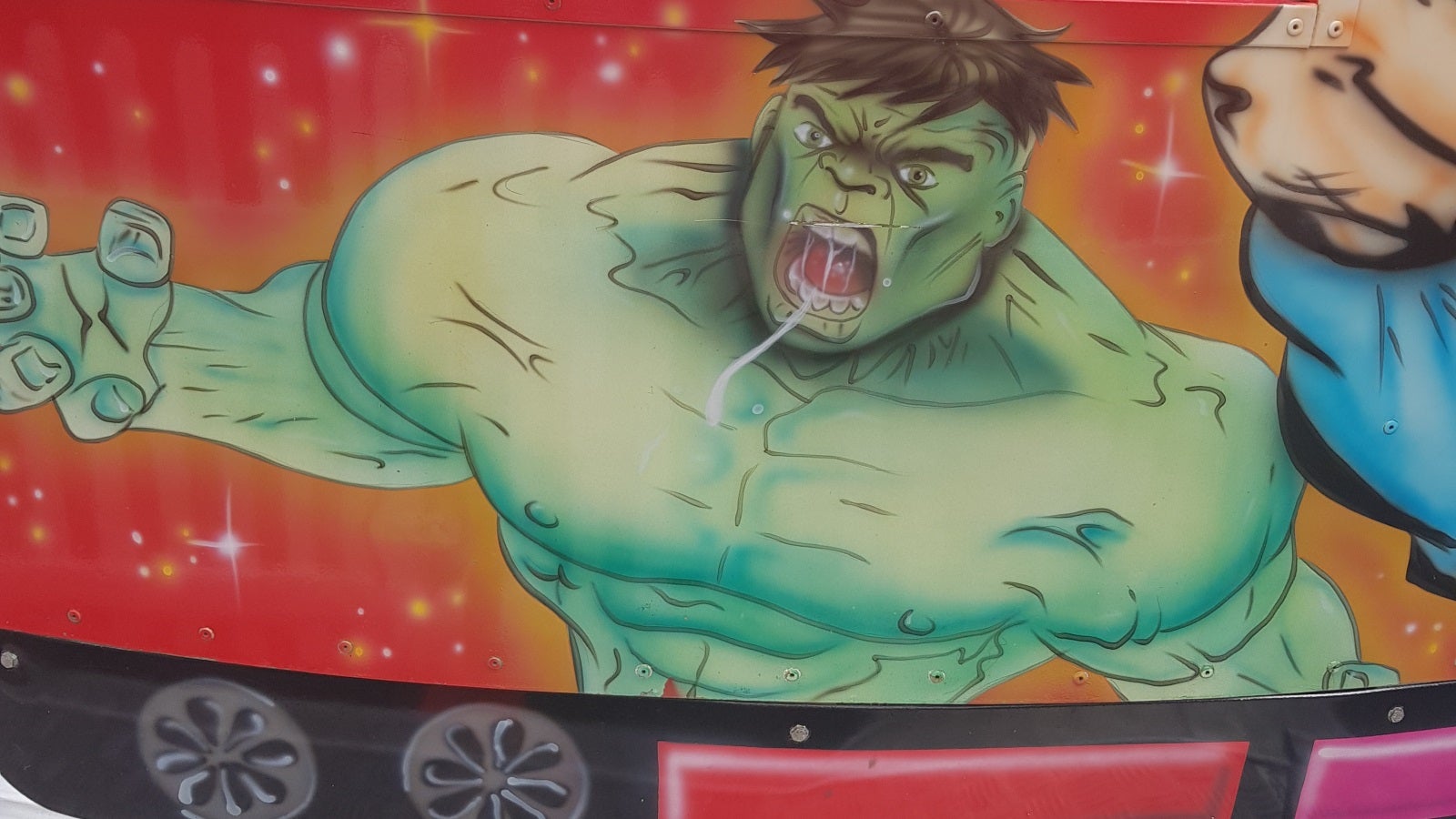 Square Enix is making a game based on the paintings of the Avengers on the sides of fairground rides
