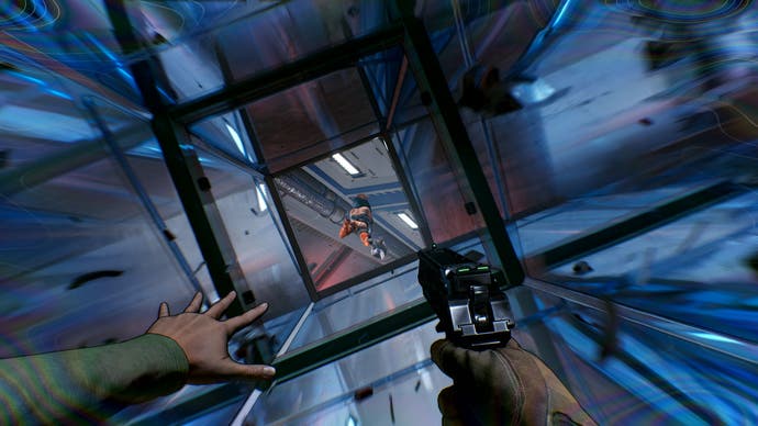 A character falling through a window-like shaft after another character, holding in a gun in one hand while the other is splayed as if bracing for impact.