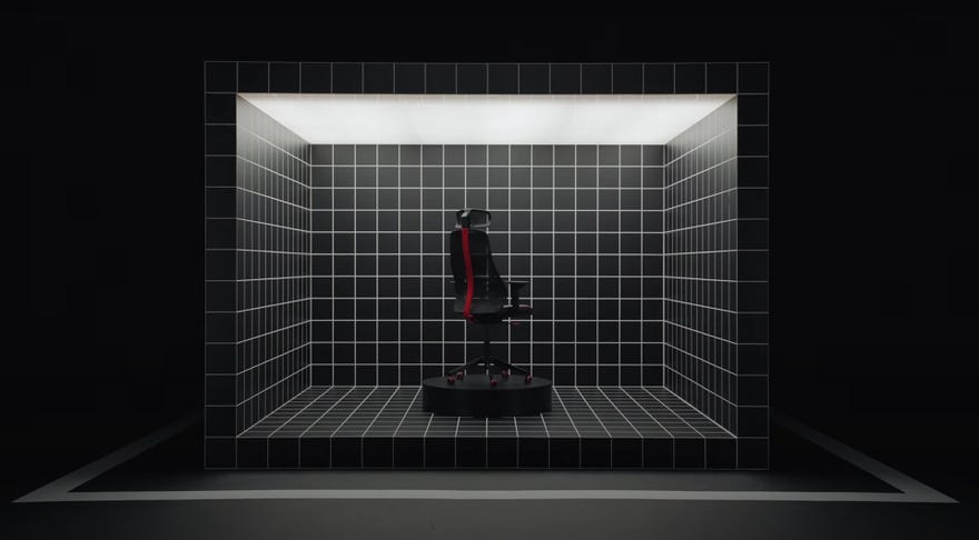 A still from Ikea's video introducing their range of gaming furniture, showing a gaming chair sat inside a cube covered in grid lines.