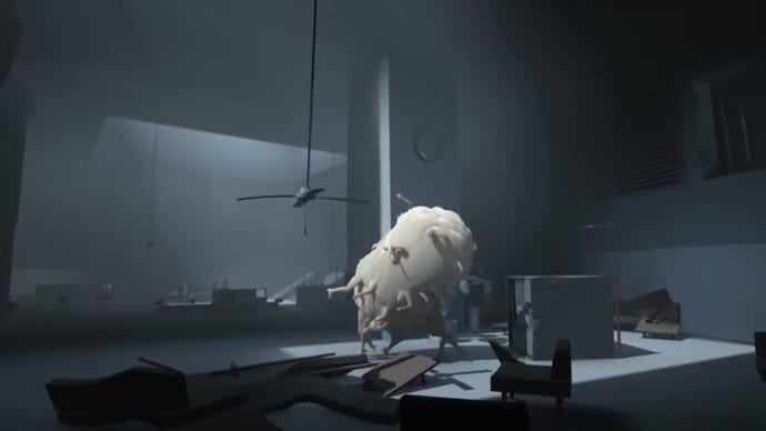 The Huddle, a tangle of limbs and flesh, stands and walks along a facility room in Inside.