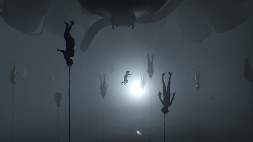 A young boy floats in mid-air, surrounded by bodies suspended upside down in Inside