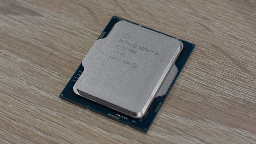 A close-up of an Intel Core i5-12400F CPU on a table.