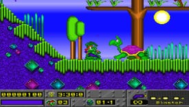A screenshot of MS-DOS classic platformer Jazz Jackrabbit, featuring the title character and an avuncular but probably threatening turtle.