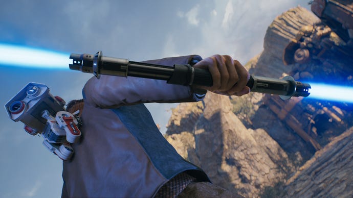 A close-up screenshot of a blue-bladed lightsaber in Cal's hand in Jedi: Survivor.