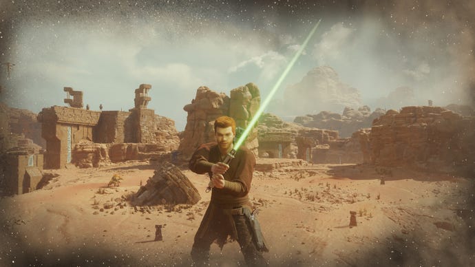 Cal erhöht sein grünes Einklingen-Lichtschwert in die Kamera in Star Wars Jedi: Survivor