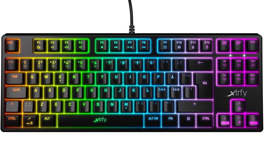 a photo of an xtrfy k4 tkl, a compact mechanical keyboard with a uk layout and bright RGB lighting