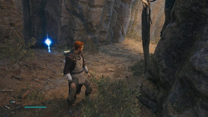 Cal stands in front of a Health Essence by a cliff wall in Jedi: Survivor.