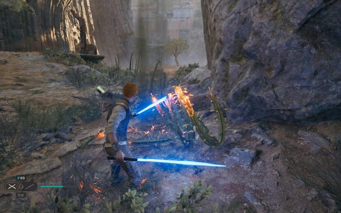 Cal slashes at a plant containing a seed pod next to a rock on Koboh in Jedi: Survivor.
