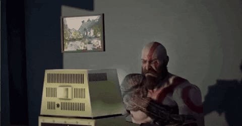 .gif of Kratos from God of War in an office, staring at a computer, then cut to him forcefully throwing the computer into a dumpster outside
