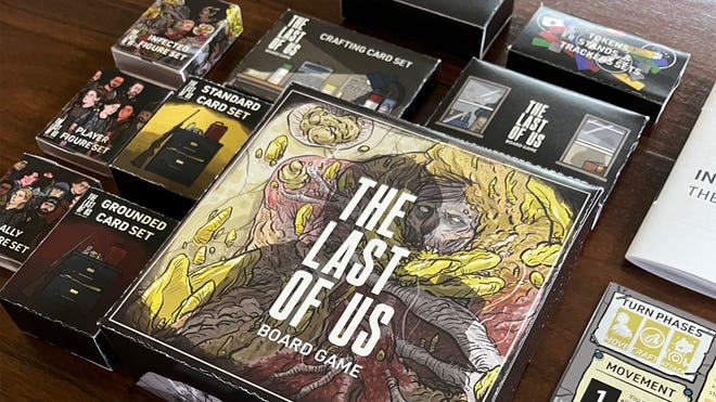 The main game box and other storage boxes from the fan-made The Last of Us Board Game