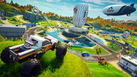 A Lego truck overlooks a futuristic building and race track in Lego 2K Drive