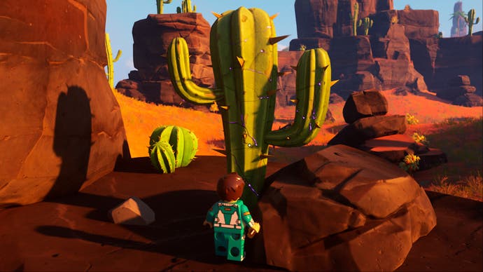 lego fortnite character facing the desert cactus
