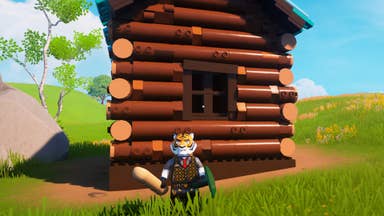 lego fortnite tiger with bread in front of log cabin