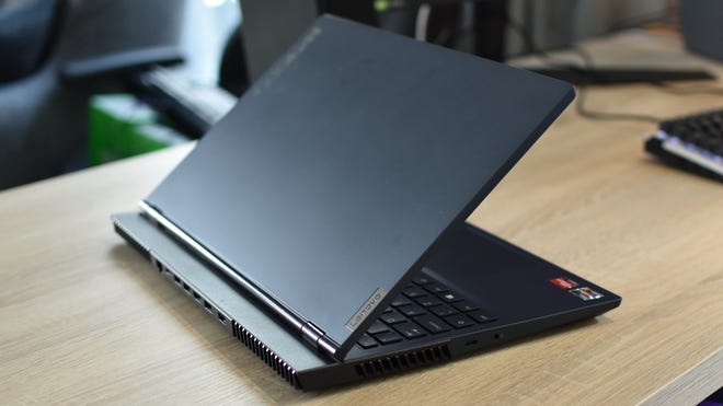 The Lenovo Legion 5 gaming laptop, partially closed and viewed from the rear.