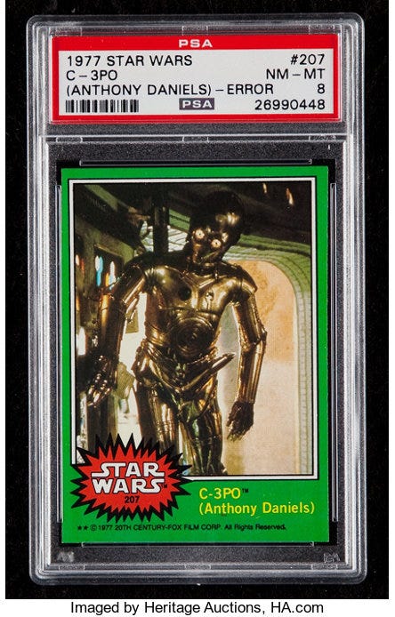 Photograph of a Green C3P0 card in a case