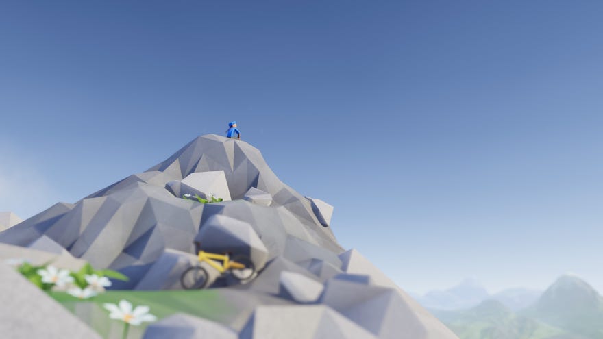 A cyclist sits on a mountaintop in a Lonely Mountains: Downhill screenshot.