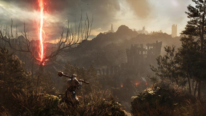A warrior with a massive mace looks out across a scarred vista in Lords Of The Fallen.