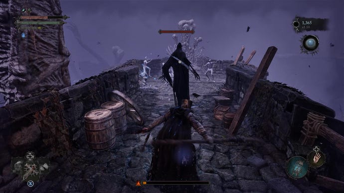 A screenshot from Lords Of The Fallen that shows the player take on a scythe-wielding wraith.