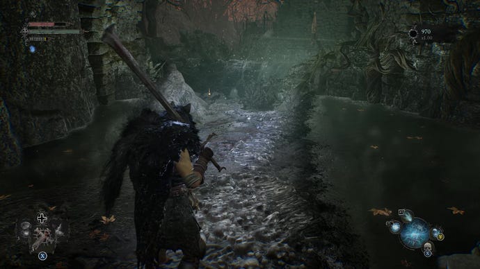 Ein Screenshot aus „Lords Of The Fallen“, der den Spieler zeigt, wie er mit einer Laterne einen zuvor unzugänglichen Bach beleuchtet und ein Umbral-Gebiet enthüllt, das er durchqueren kann.