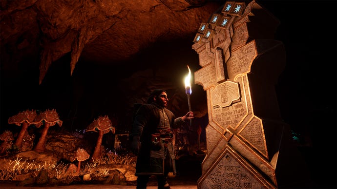 A Dwarf illuminates a History Stone with their torch, in LOTR: Return To Moria.
