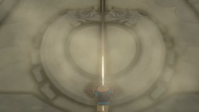 Link trying to push open a huge door with a sliver of sunlight peeking through the middle in The Legend of Zelda: Tears of the Kingdom.