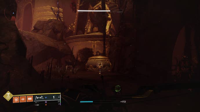 The loyal companion chest on the ground next to the dog statue