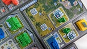 Magnate: The First City is a metro-building board game striving for realism and interactivity