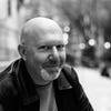A black and white portrait of Marc Guggenheim