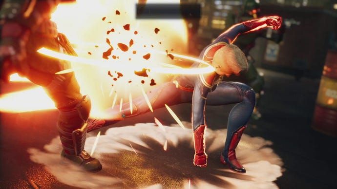 Captain Marvel strikes a pose after biffing a Hydra soldier in Marvel's Midnight Suns