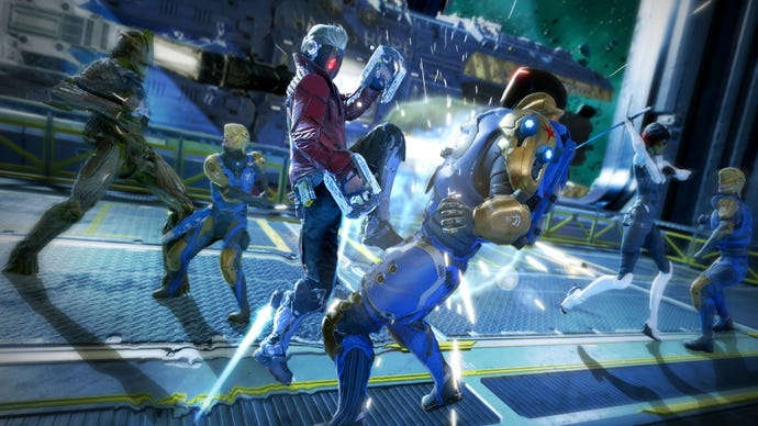 Star Lord delivers a devastating kick to a member of the Nova Corps, as Groot and Gamora back him up.