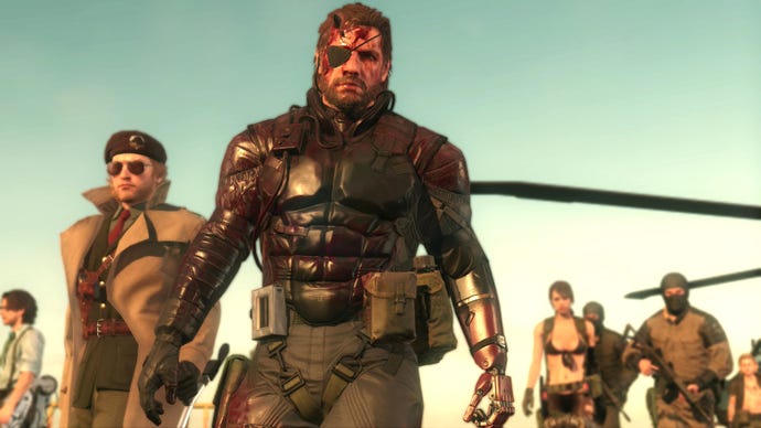 A bloodied Snake and co. step off a helicopter and walk towards the camera in MGSV: The Phantom Pain.